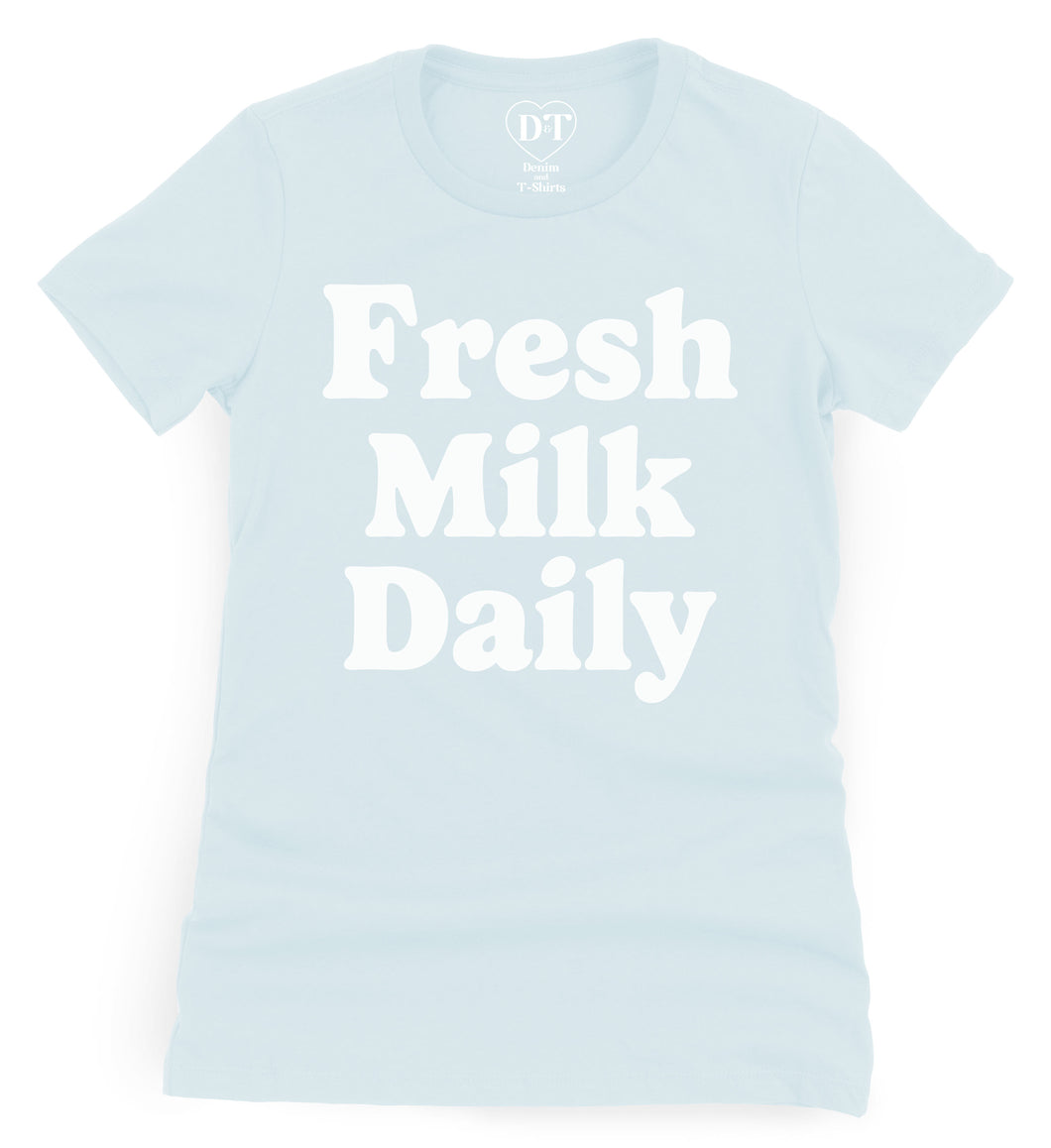 Fitted light blue t-shirt with Fresh Milk Daily artwork screen printed across the front.